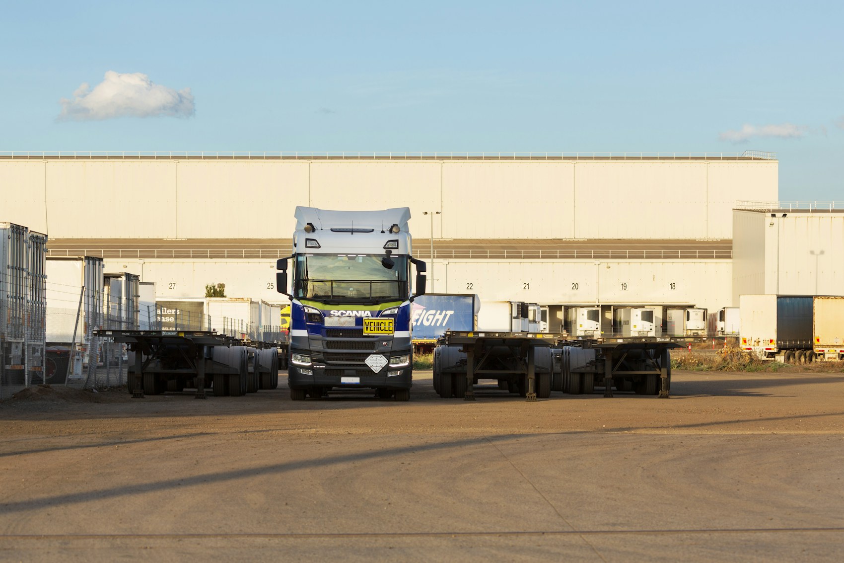 Commercial truck at a logistics facility